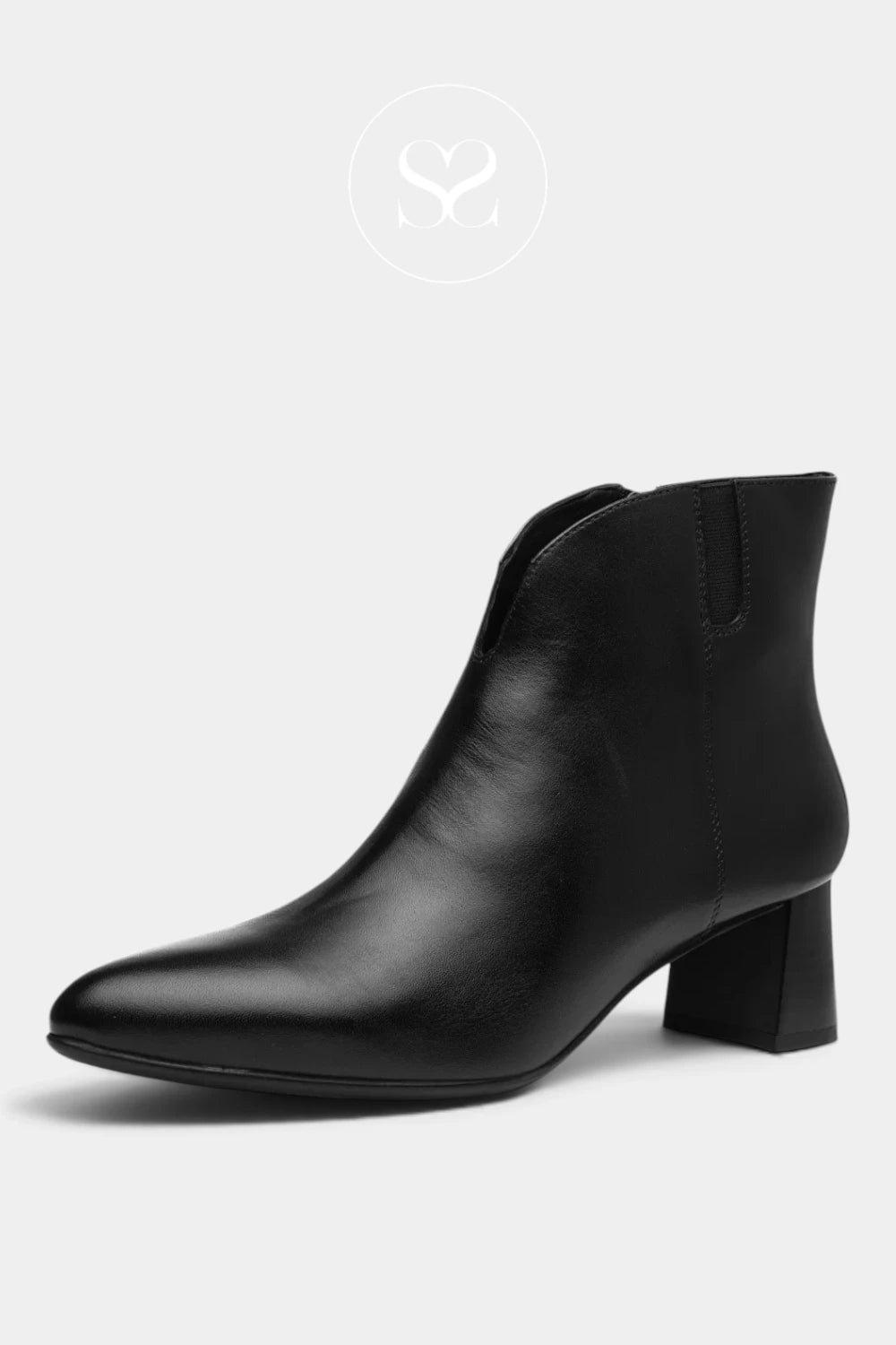 A black leather ankle boot with a pointed toe and a low block heel, shown from a side profile on a light gray background.