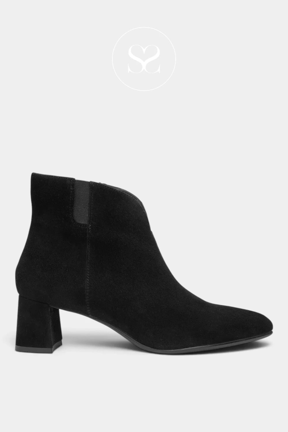 A black suede ankle boot with a block heel and pointed toe, shown in profile against a light gray background.