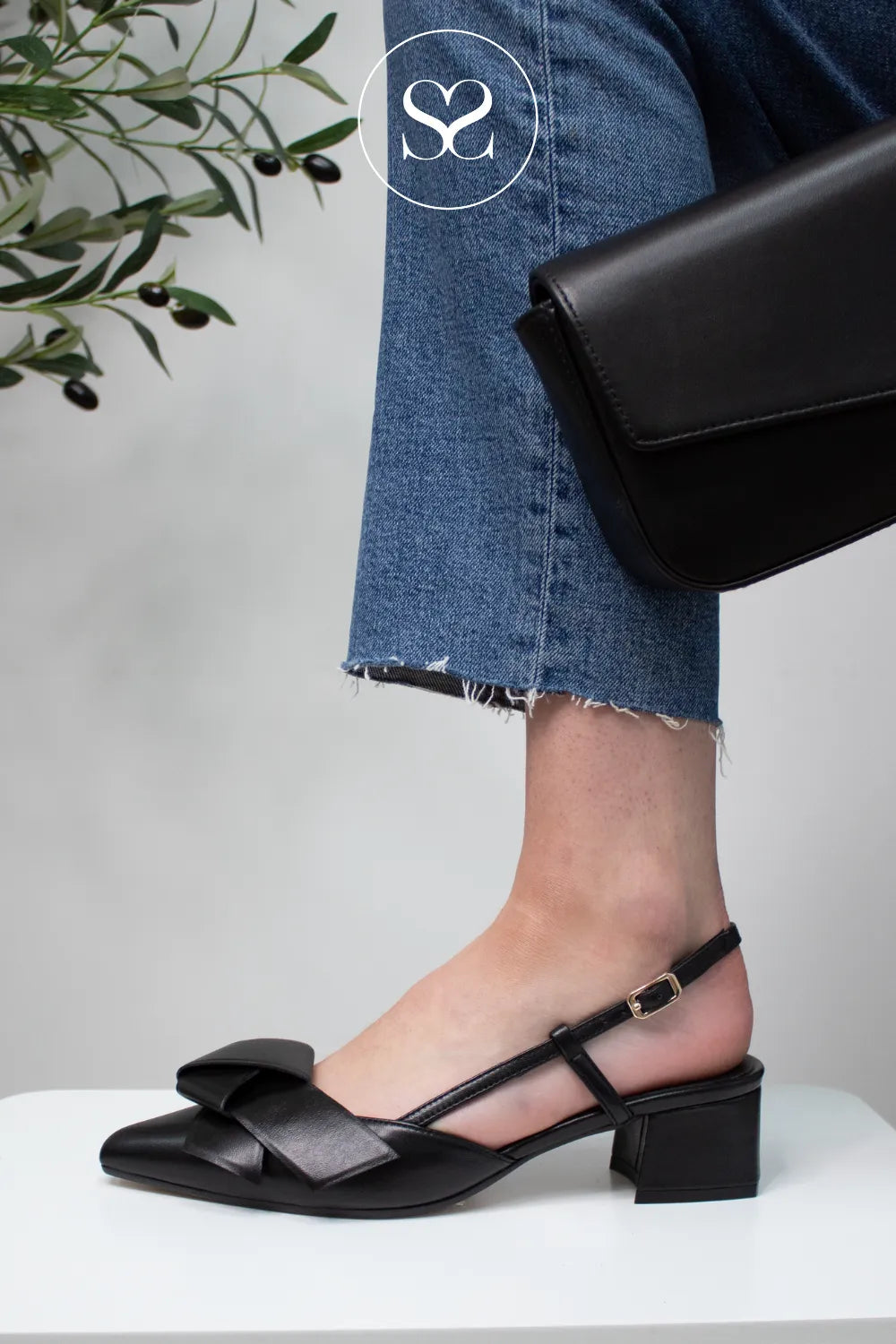 LODI Black Slingback Heels - DIMI Sleek black leather finish that pairs beautifully with any outfit.