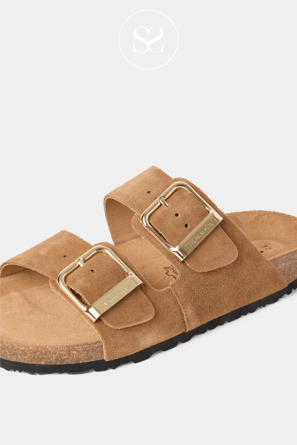 Pair of tan sandals with gold buckles on a white background from Tamaris