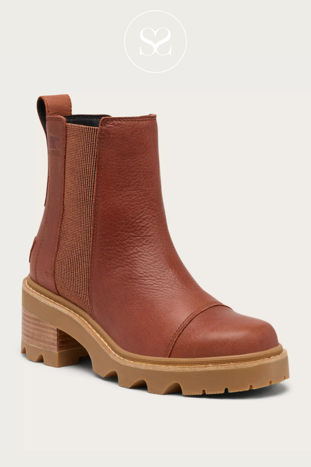 Brown leather ankle boot with chunky sole on a white background
