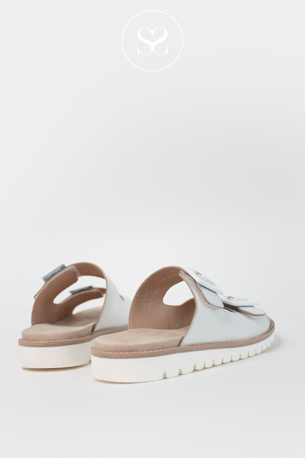 Comfortable summer holiday sandals. Slip on, birkenstock style sandals with slight wedge sole. Wedge slider sandals