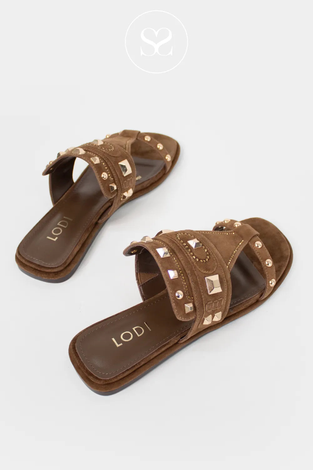 Brown sandals with gold studs. Gladitaor style sandals. Slip on style. Brown suede with gold studs.