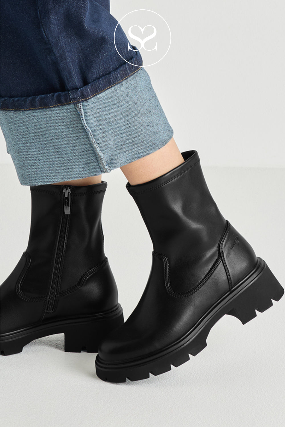 Black Leather Chunky Boots with a Platform Sole and a Zip Closure for Women in Ireland