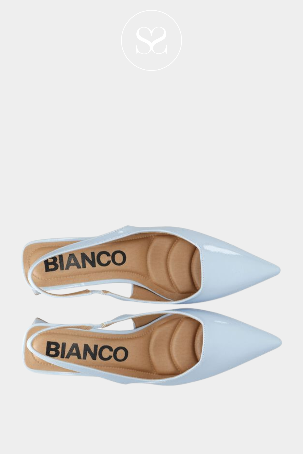 Pale blue patent occassion shoes. Dressy pointed toe heels. Triangular block heel with elasticated slingback and cushioned insole