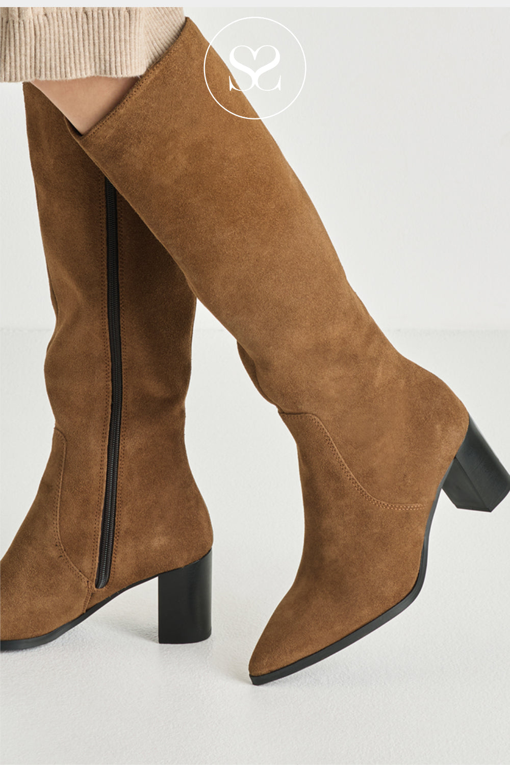 Tamaris knee-high boots with suede leather, a pointed toe, 65mm block heel, and a full-length inner zip, designed for smart everyday wear