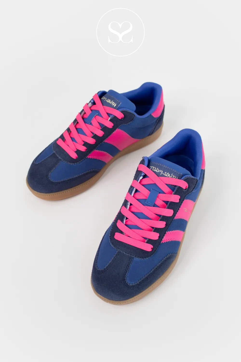 Blue and pink sneakers on a white background from teddy smith