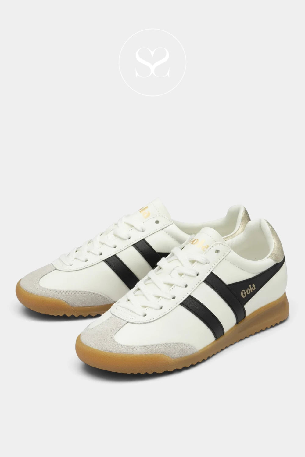 A pair of retro-style low-top sneakers in off-white leather with black side stripes, a black heel tab, and a gum rubber sole, shown on a light gray background. The brand name 'Gola' is printed in gold on the heel tab.