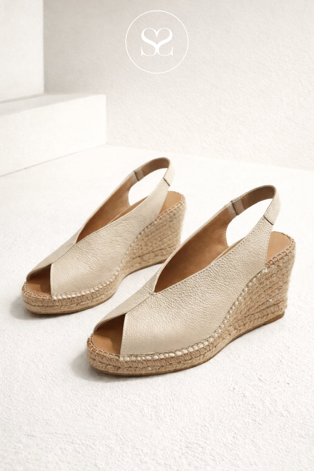 Pair of beige espadrille wedge sandals on a white background 2200 from Viguera