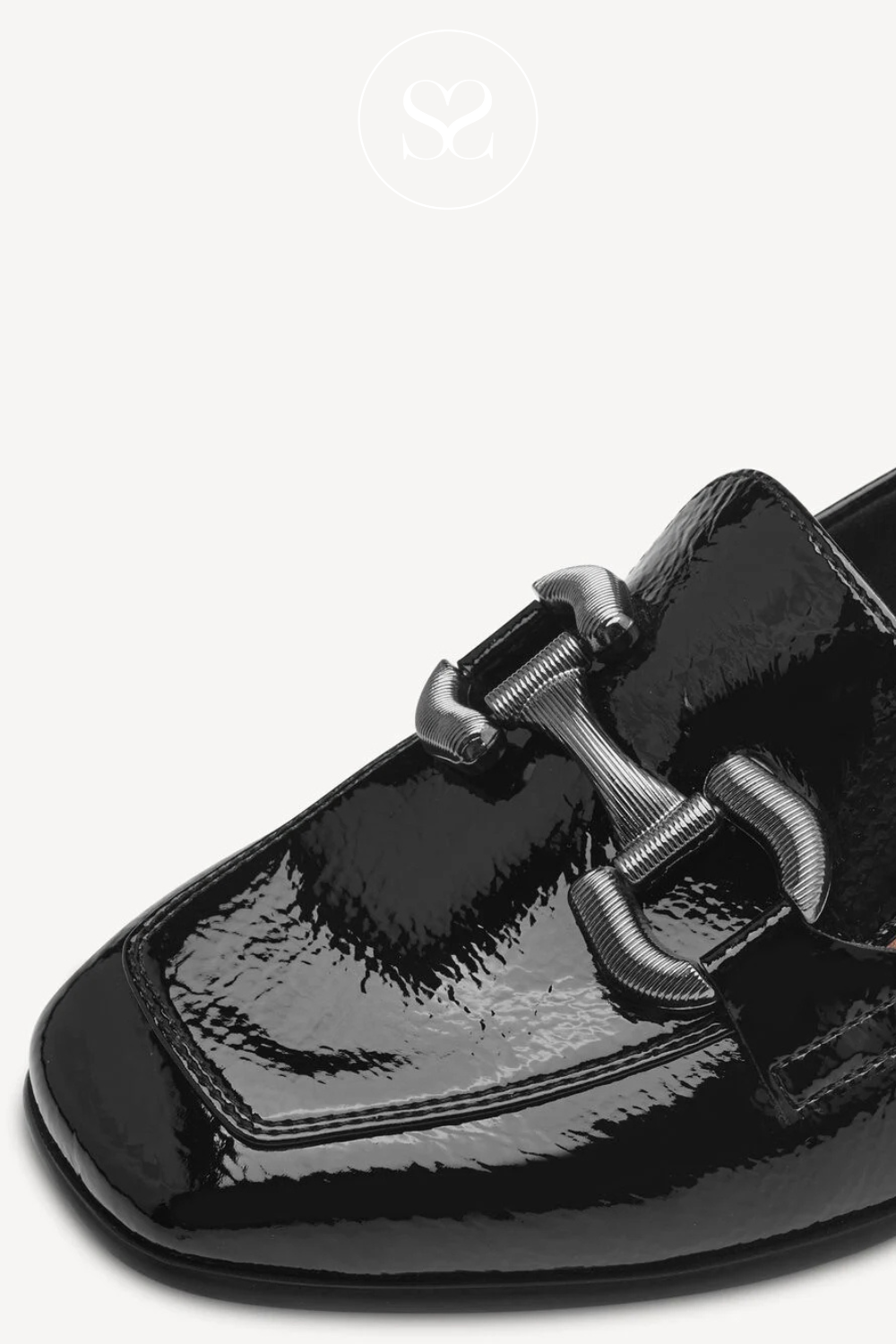 Square toe loafers. Heeled loafers. Black patent shoe with low block heel.