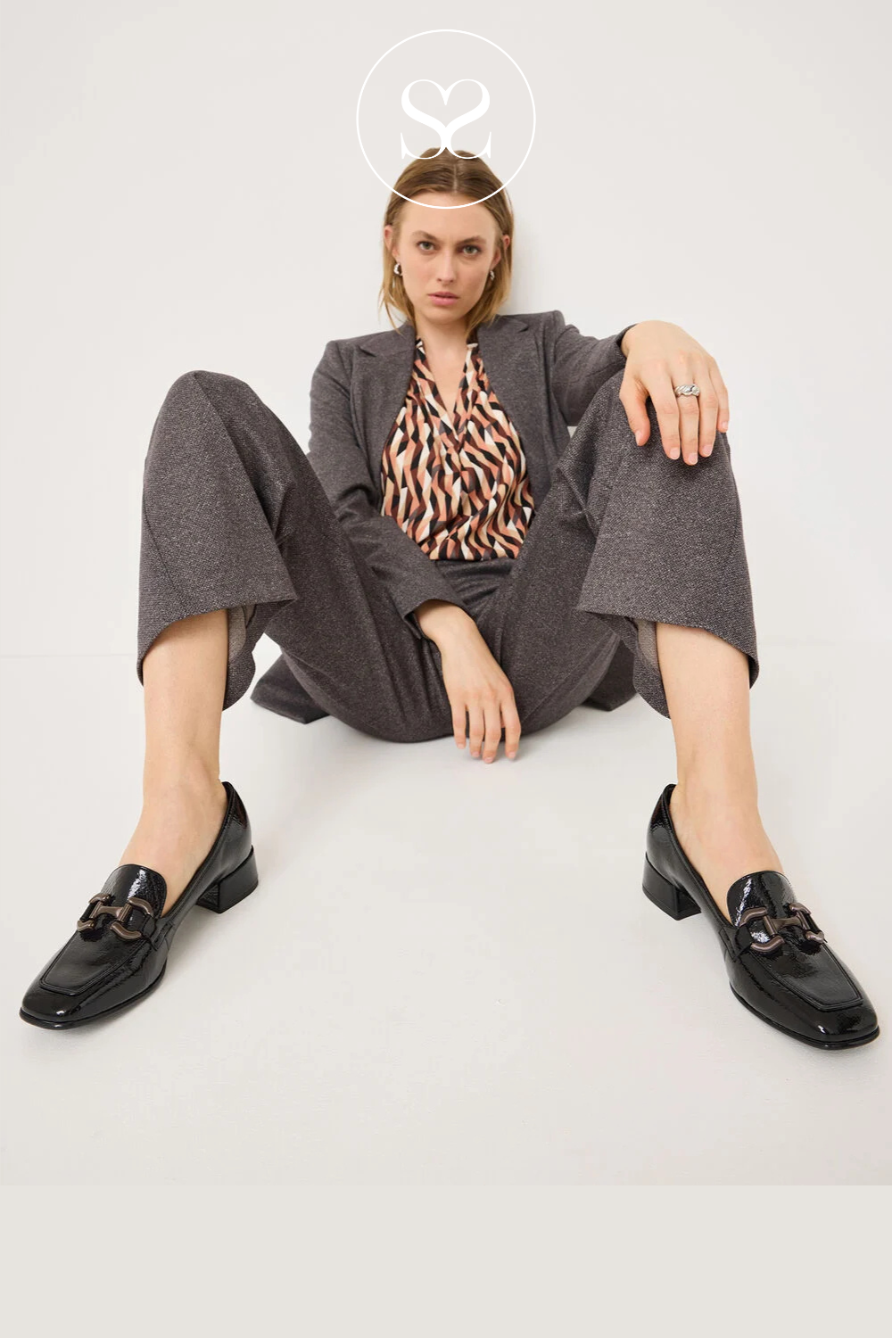 Tamaris black patent square toe loafer. Block heel, mid heel, chain detail, leather lined. Office shoe.