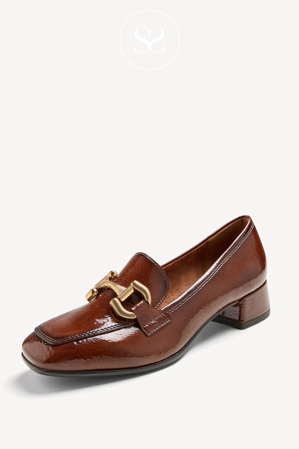 Tamaris brown patent slip on shoe with leather lining. Low block heel, gold chain. Square toe.