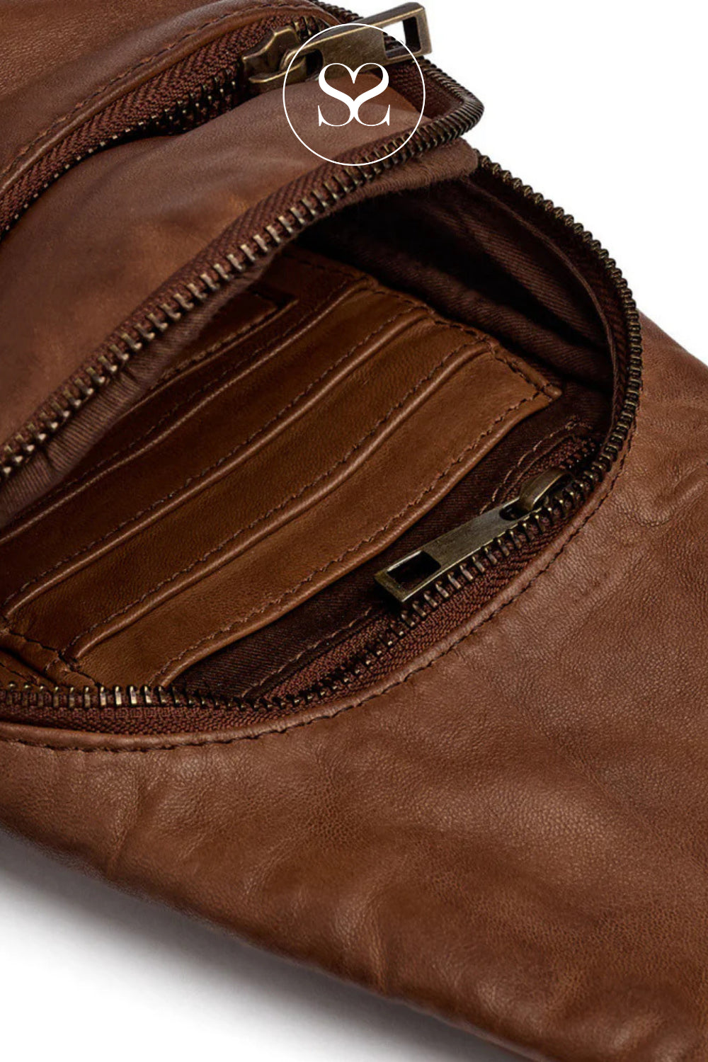 Close-up of a brown leather pouch with a zipper, featuring a brand logo.