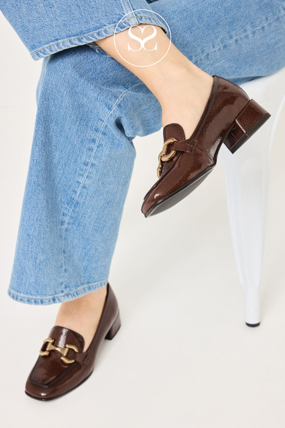 Brown work shoes. Women's shoes. Heeled loafers.