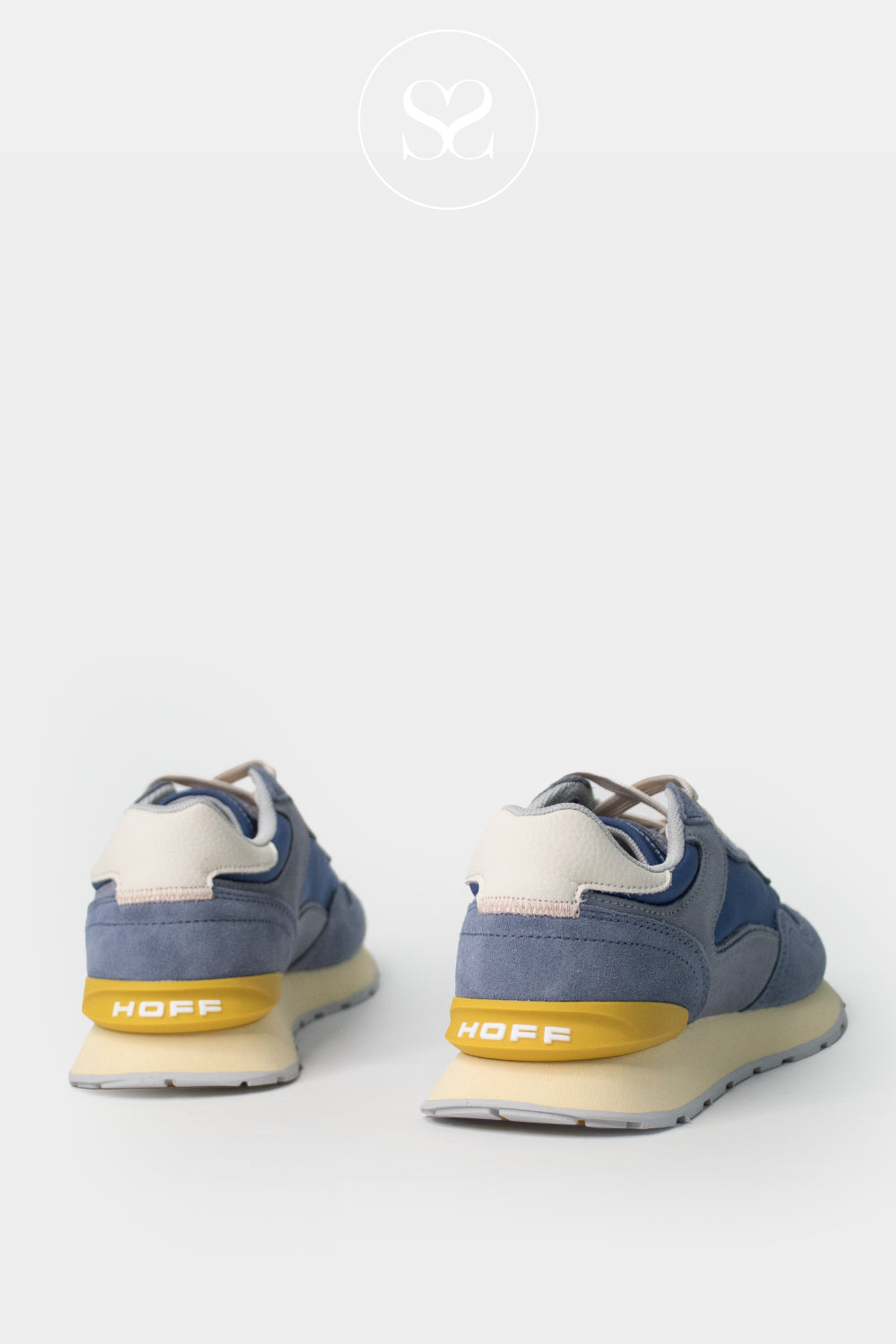 Pair of blue women's sneakers with white soles and yellow accents on a white background from HOFF