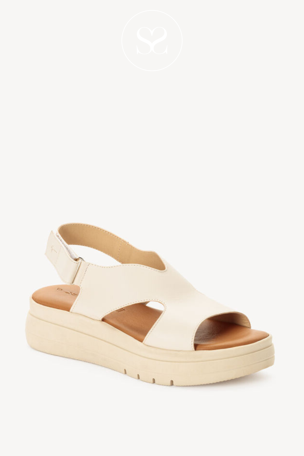 Neutral slightly elevated wedge sandals. Comfortable walking sandals
