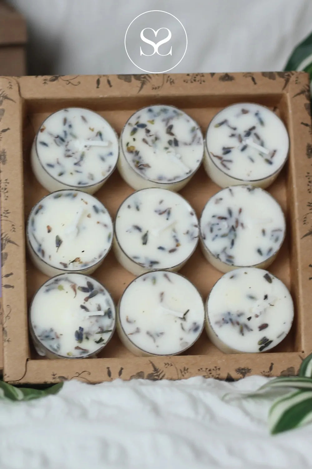 FLOWER CHILD 9 PACK TEALIGHTS - WOODLAND WARMTH Grounding Cedarwood and Lavender blend that calms the mind and reconnects you with nature.