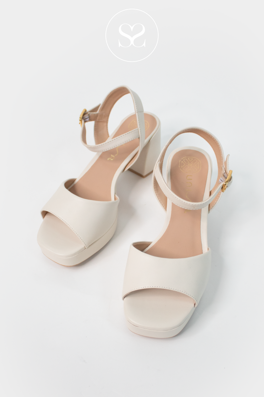 Unisa cream leather platform sandals, adjustable ankle strap. Block heels