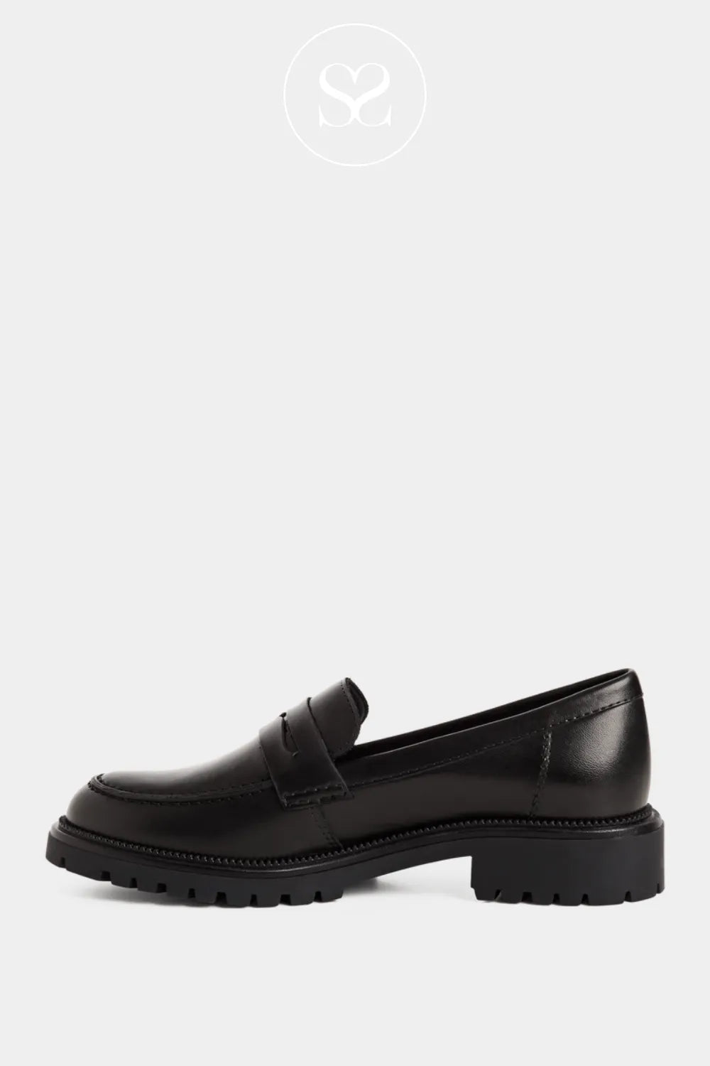 Black leather slip on shoes. Chunky loafers.