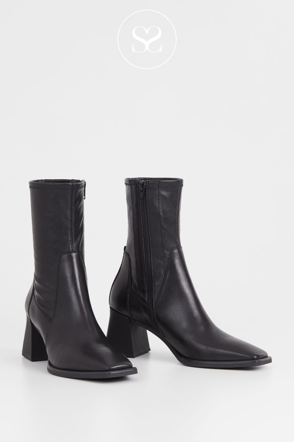 Comfortable black leather boots for the office with block heel and squared / pointed toe