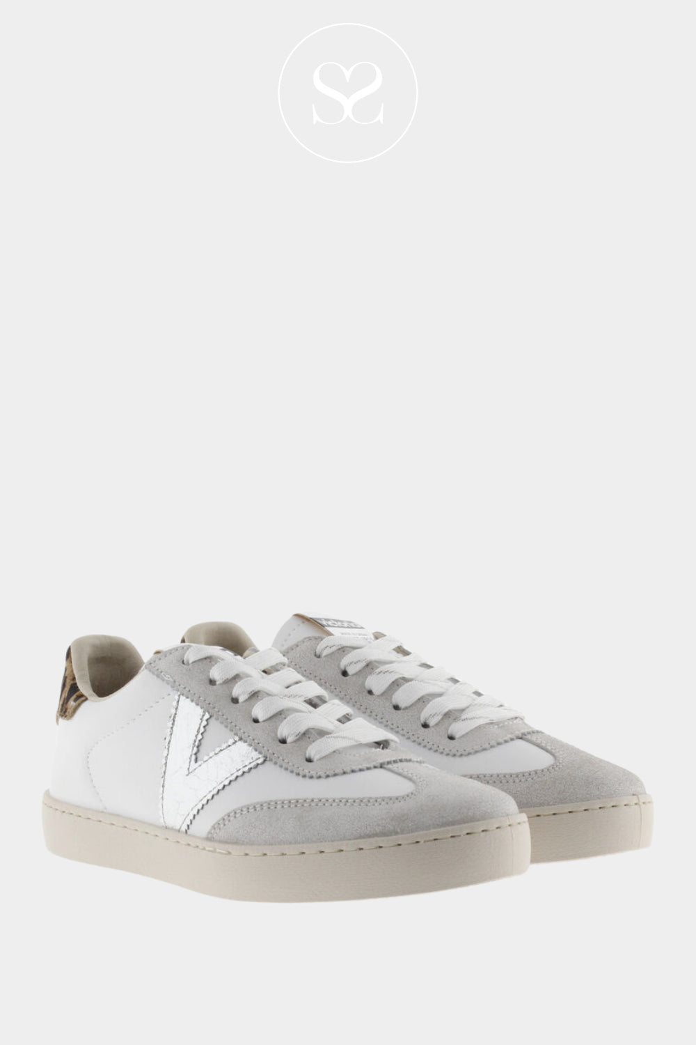 Comfortable white trainers with silver V detail and leopard print heel cap