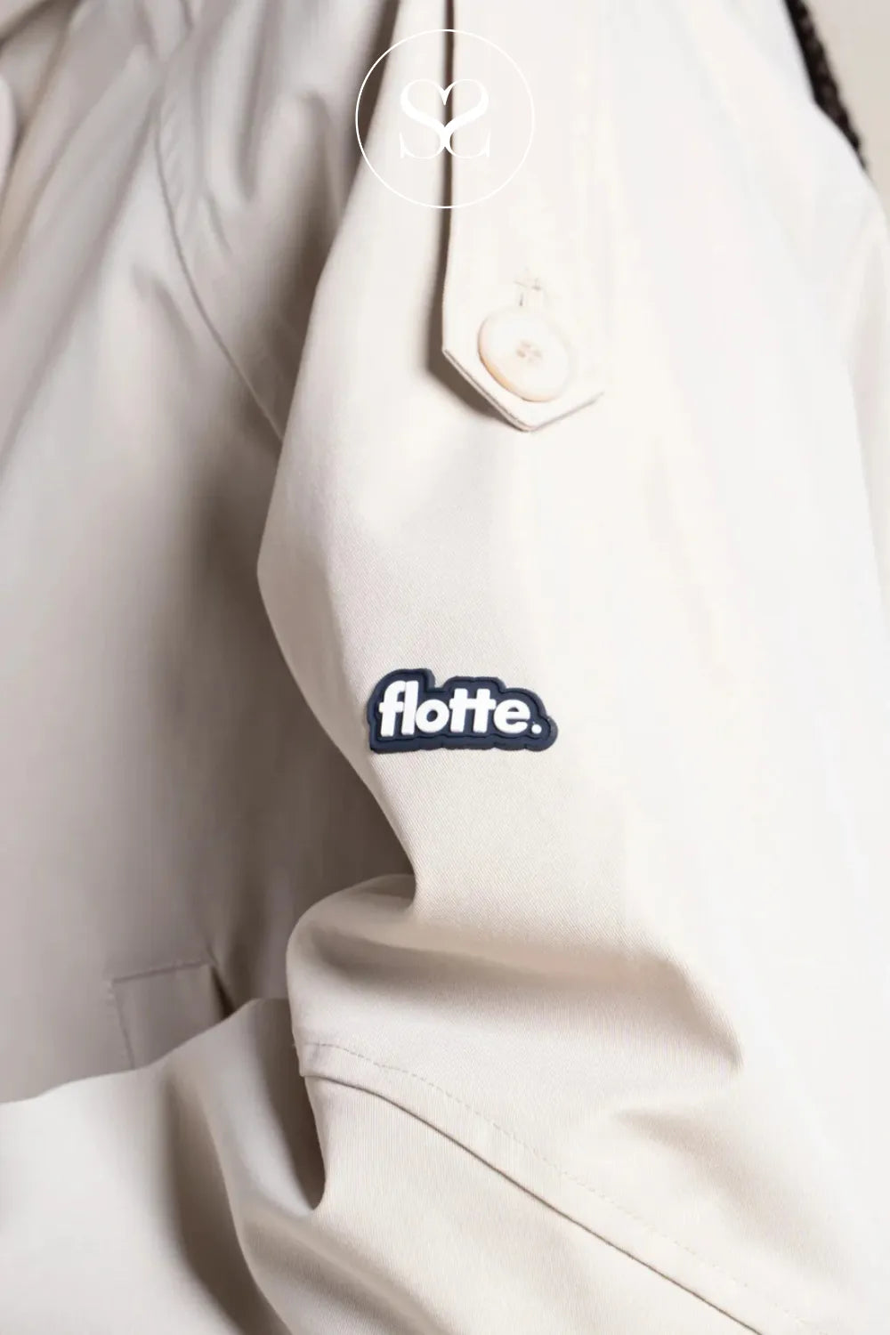 FLOTTE CREAM WATERPROOF RAINCOAT MADE FROM RECYCLED POLYESTER