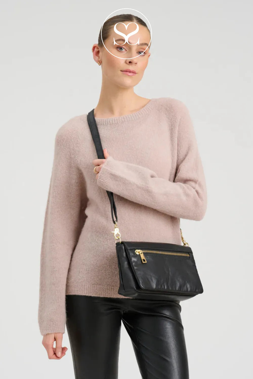 Depeche 17056 black leather crossbody bag with gold hardware and front zip and long strap