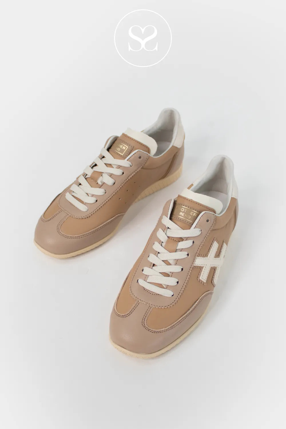 Another Trend camel leather lace up trainers. Off white logo, laces and heel cap. Casual style trainers. Retro style neutral sneakers with off white hashtag logo on the side.