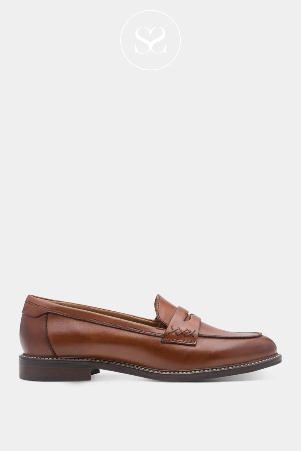 Tan leather slip on loafers. Round toe shoe