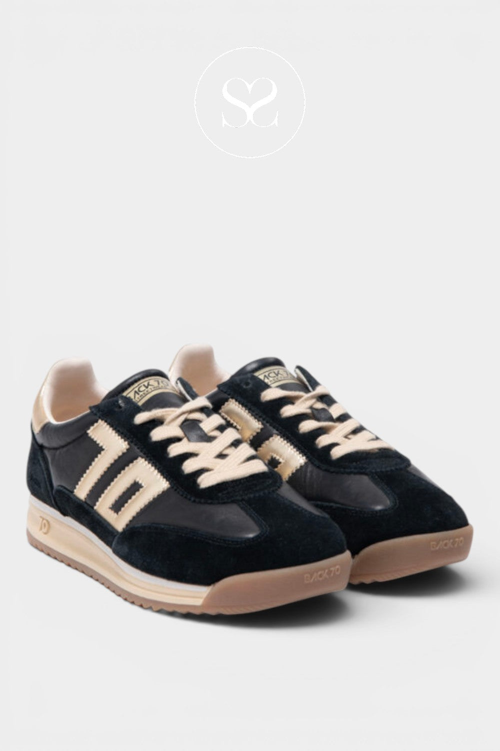 Black and gold chunky trainers with beige lace and rubber sole