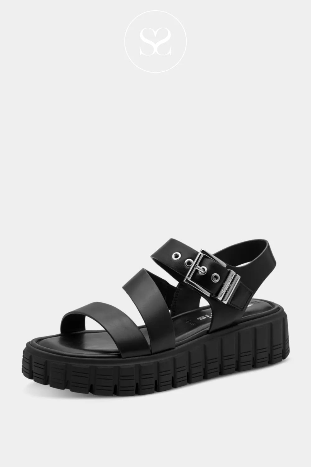 Black flatform sole sandals with strap across the toes and assymmetrical strap across the foot. Adjustable ankle strap with silver hardware.