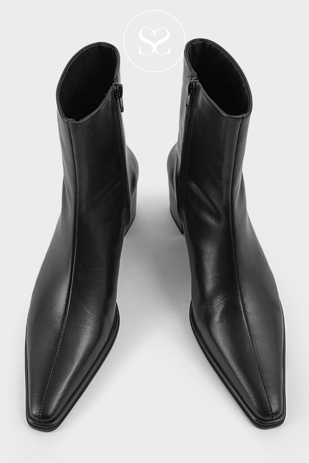 Close-up of the black leather Vagabond Giselle ankle boots, highlighting the texture, pointed toe shape, and side zipper detail.