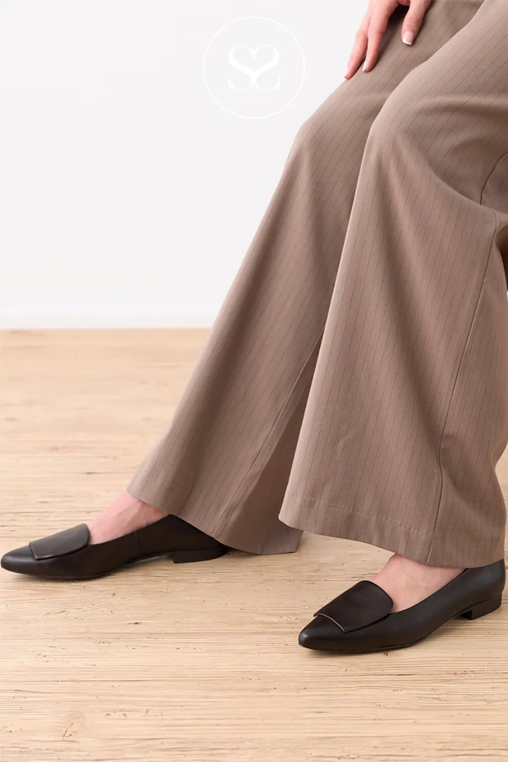 Paul Green Sleek dark brown leather flat with a clean, polished finish and minimal detailing for Women