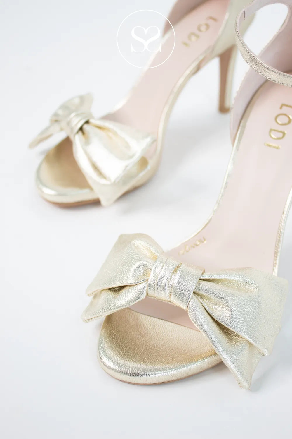 LODI Gold High Heel Sandals - INGAL the stylish bow detail adds a touch of delicacy