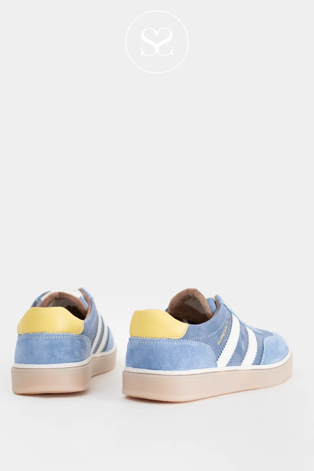 Drilleys blue suede round toe sneakers with white stripes and yellow heel cap. Comfortable, affordable trainers with laces.