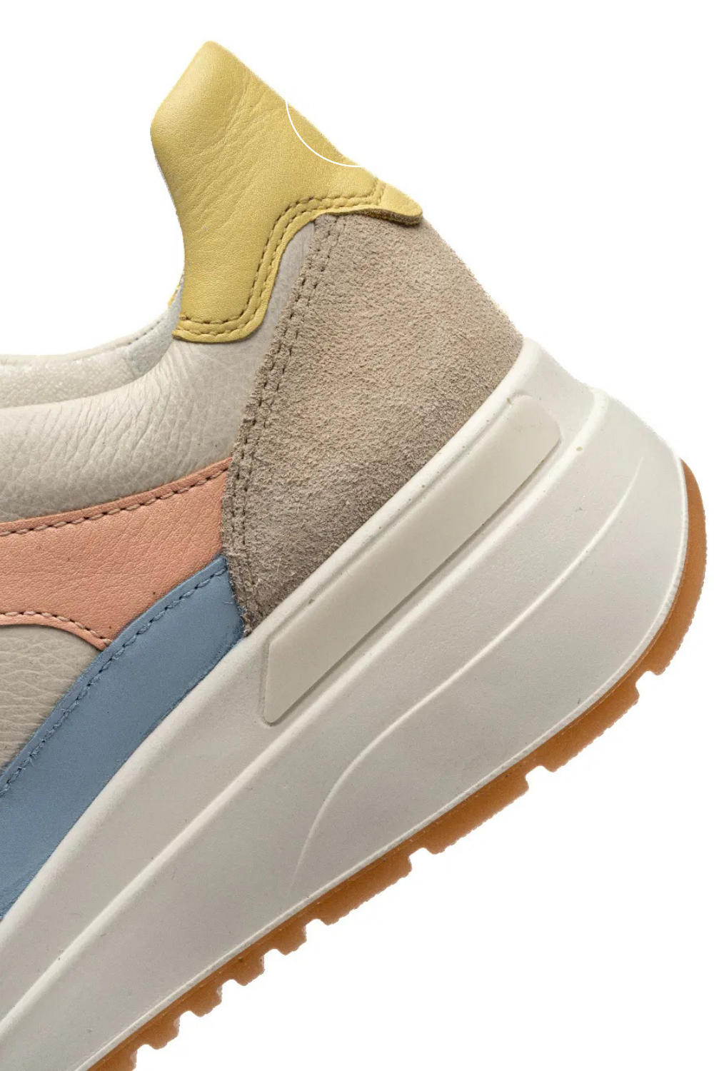 Multicolored sneaker with beige, blue, and pink accents. Wedge trainers