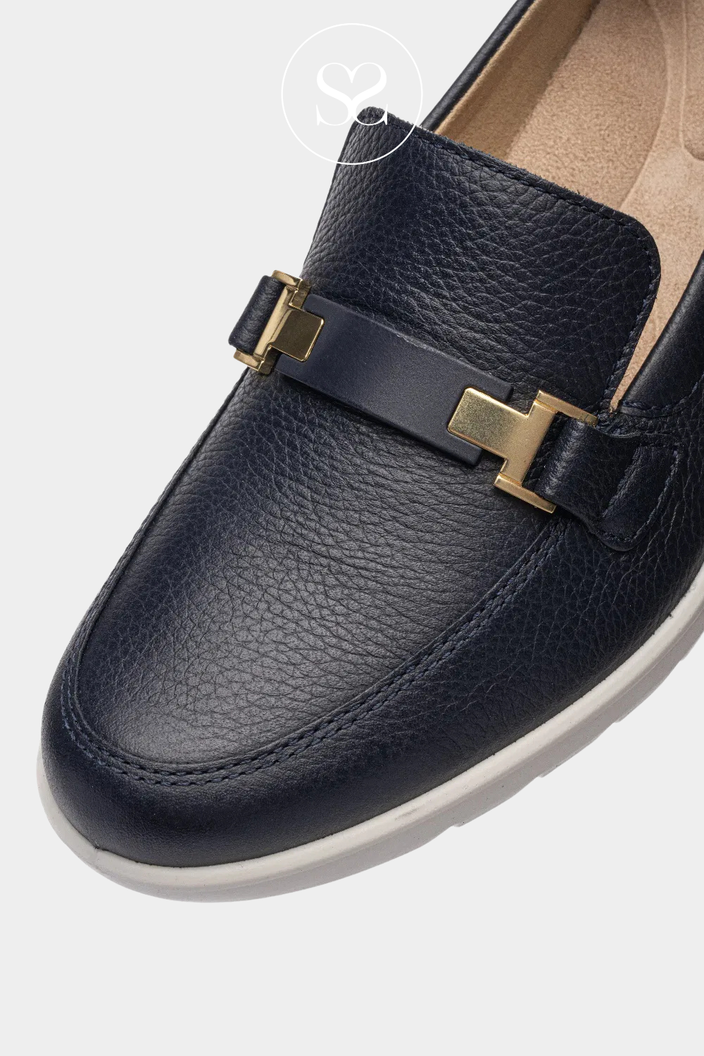 ARA navy leather wedge shoe. Slip on style with gold buckle. White elevated sole. Cushioned insole with arch support. Soft leather