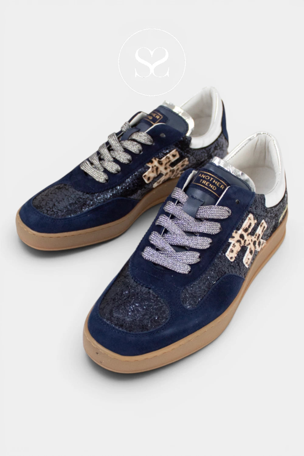Comfortable navy trainers from Another Trend with glitter detail and gum sole