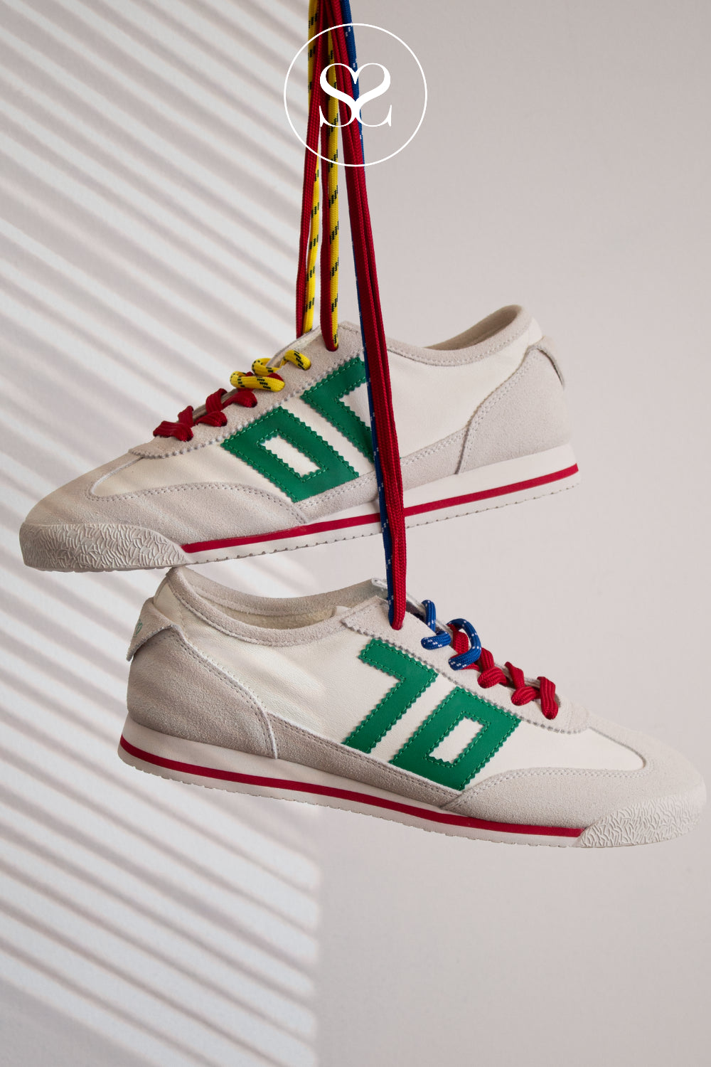 back 70 white trainers fow women with green accents