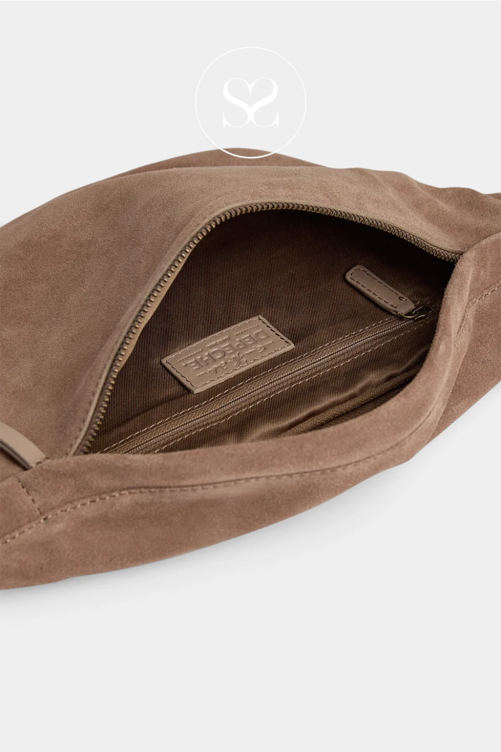 Close-up of a brown suede or faux-suede bag opening, showing a zippered interior pocket with a small branded leather patch inside. The exterior material is a warm taupe-brown, and the interior lining is a darker brown.