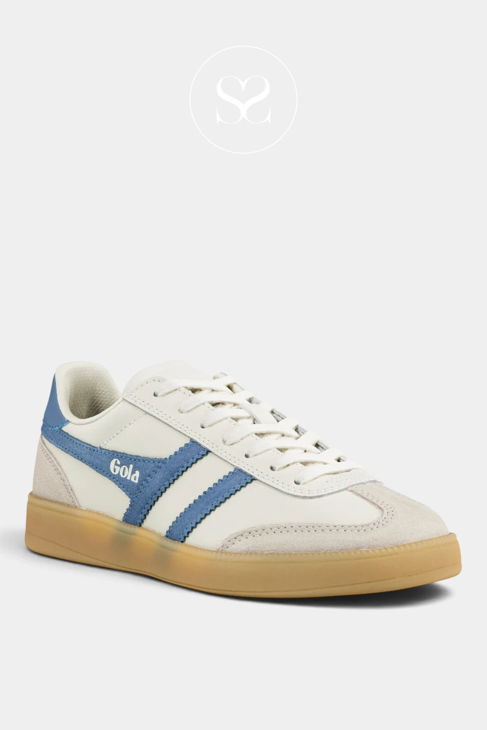 A low-top sneaker in off-white suede and leather with blue side stripes, a gum sole, and 'Gold' printed on the side, shown against a light gray background.