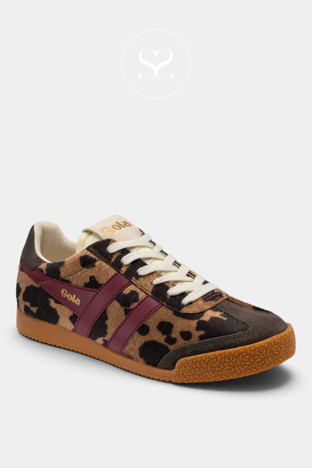A single Gola brand low-top sneaker shown from a three-quarters angle on a light gray background. The shoe features a brown and black leopard print upper, a burgundy side stripe, cream laces and tongue, and a brown gum sole.