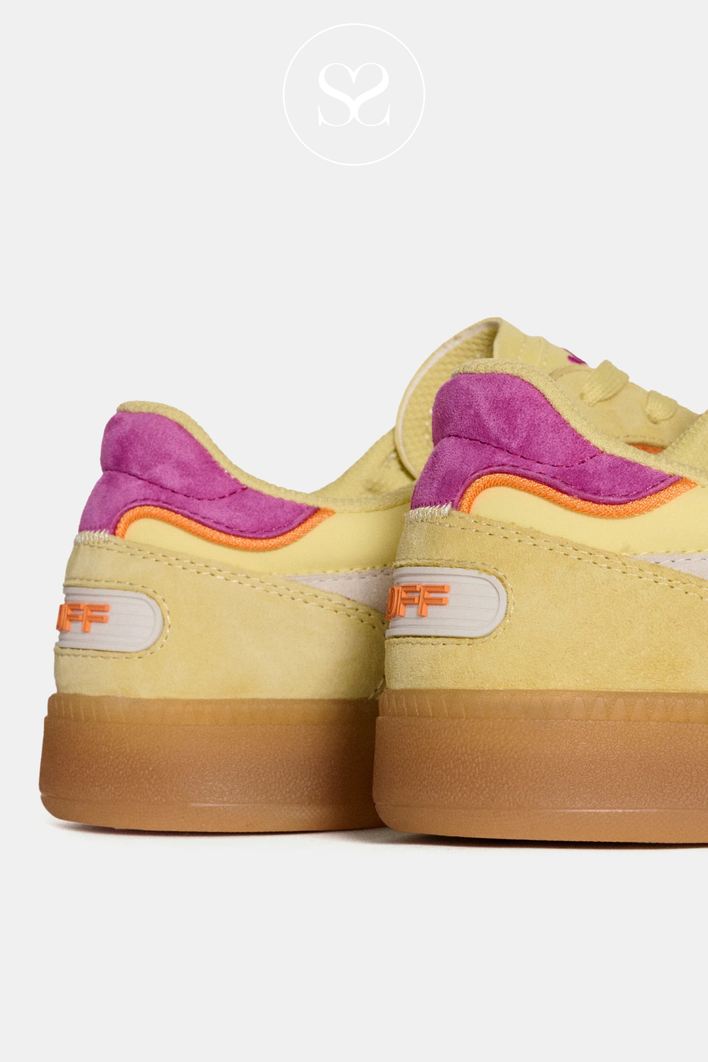 Yellow sneakers with a pop of pink and orange. Cushioned footbed and laces.