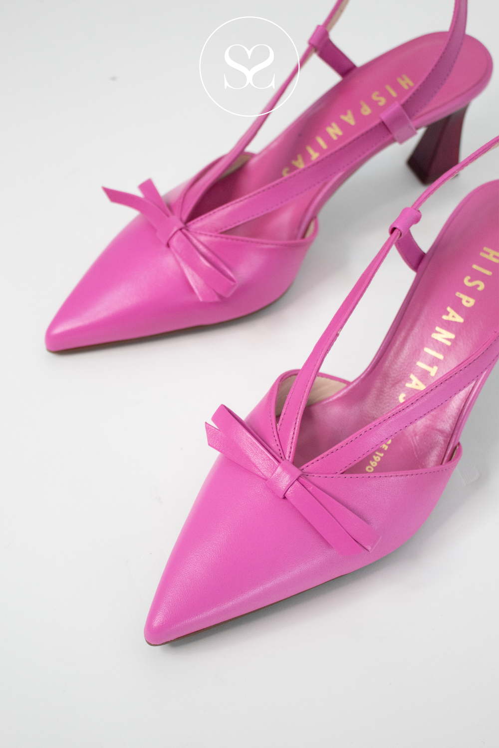 Hispanitas HV264678 pink slingback mid heels. Adjustable ankle strap, pointed toe, wider base heel, cushioned insole. Bow feature. Elegant, classy style. Weddings, confirmation, communions