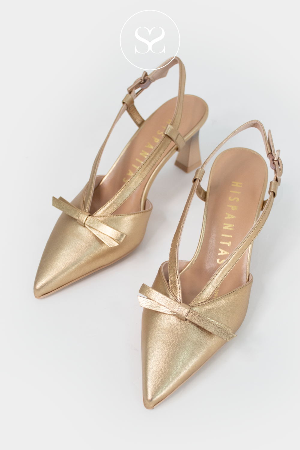 Hispanitas occasionwear heels. Metallic antique gold pointed oe slingback heels. Adjustable strap , bow detail and cushioned insole
