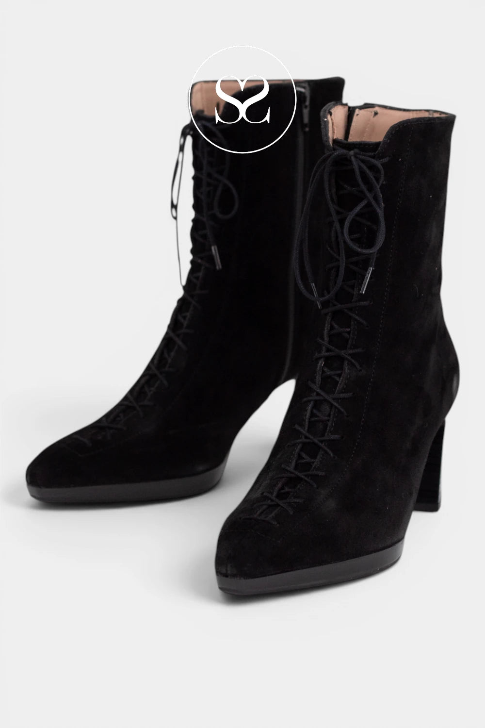 Block heel black suede boots with fine lace and inside zip. Platform sole and block heel.