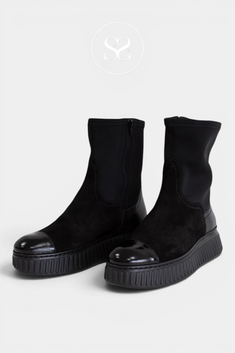 Black platform sock boots with a chunky sole, designed with a ribbed outsole for a modern, fashion-forward finish - Ireland