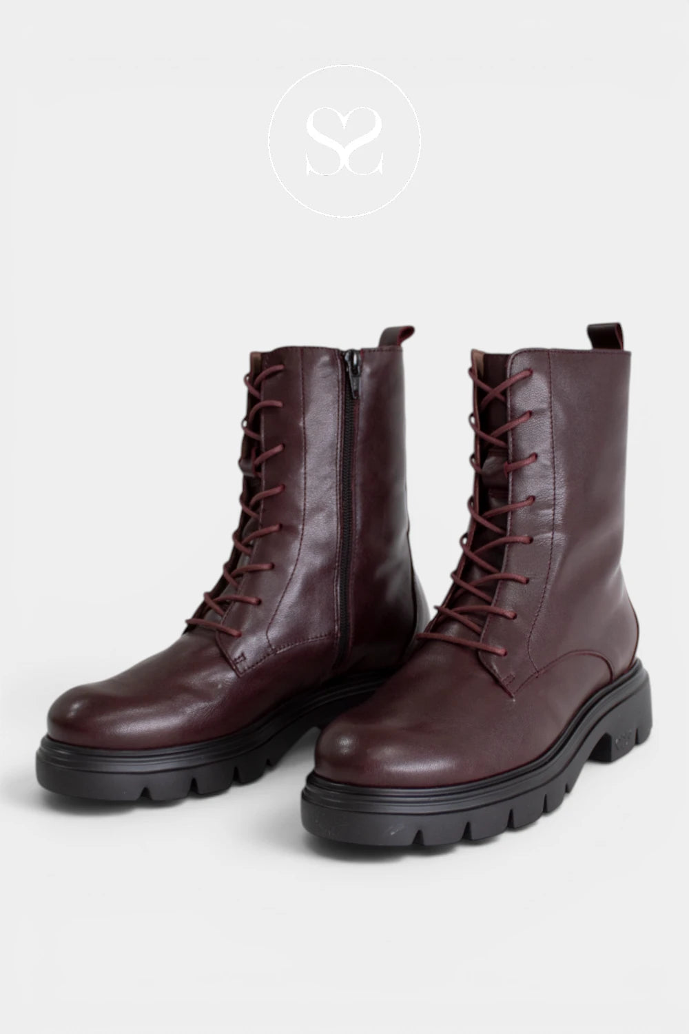 Burgundy military-style boots combining classic lace-up detailing, a pull tab and a durable cleated sole for added grip - Ireland