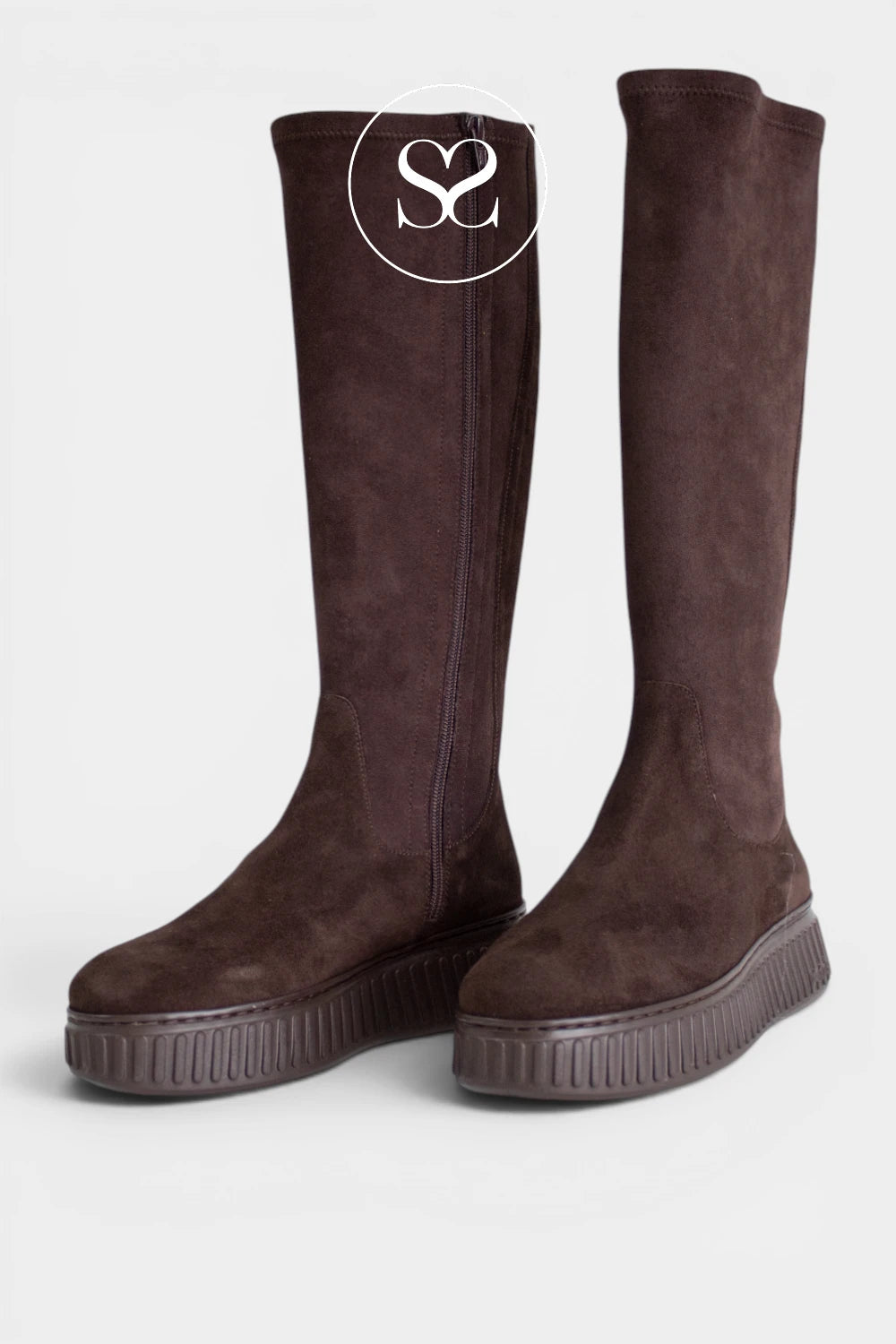Chunky Brown long boots for women combining textured leather, a bold platform sole and simple tonal detailing for a versatile casual look.