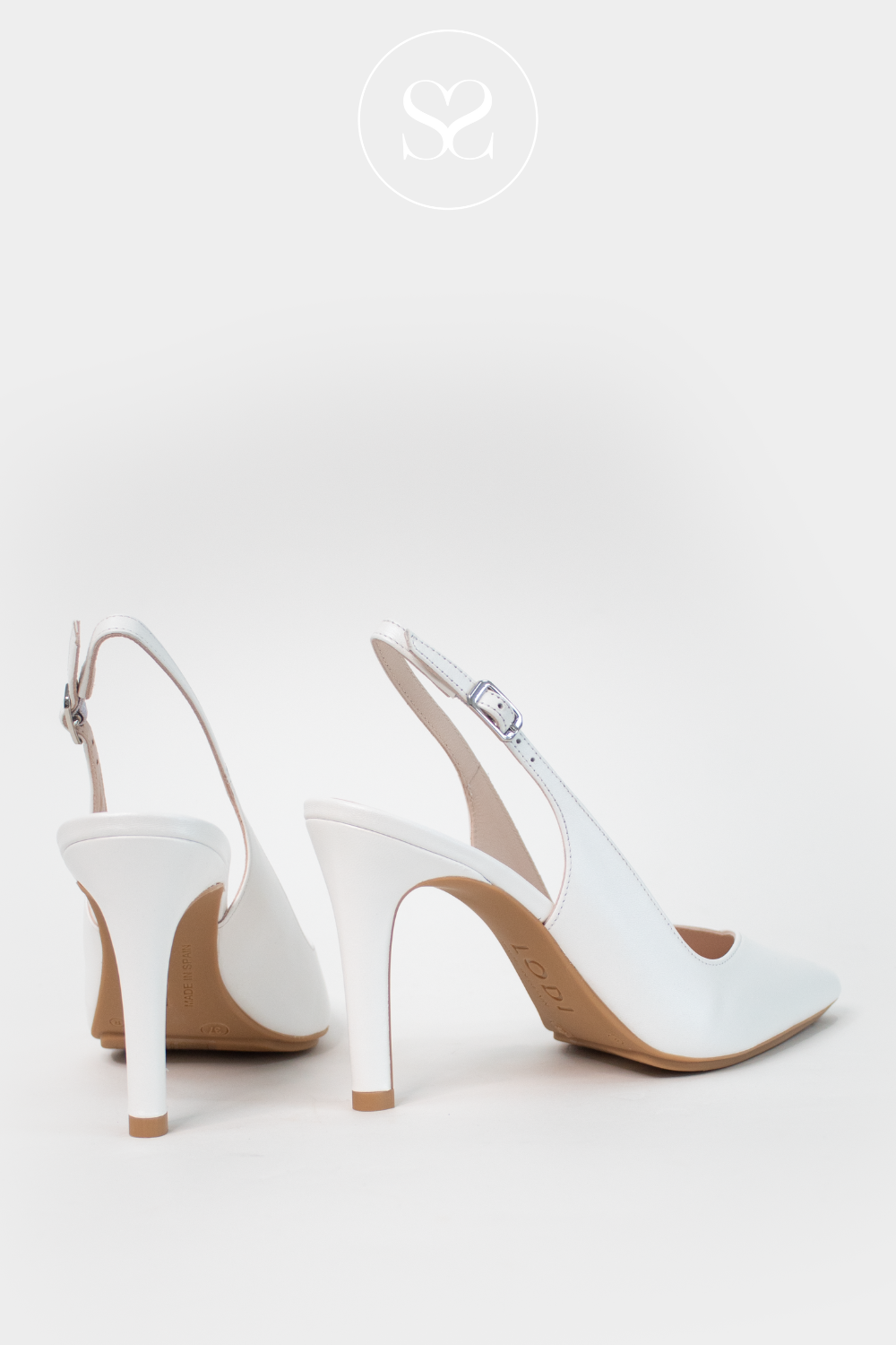 High heeled white leather summer heels. Slingback Lodi shoe with adjustable ankle strap. V-cut pointed toe heels with gel cushioned insole for added comfort. Occassion shoe. Wedding heels